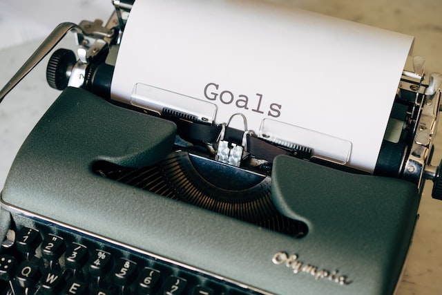 A typewriter with written Goals