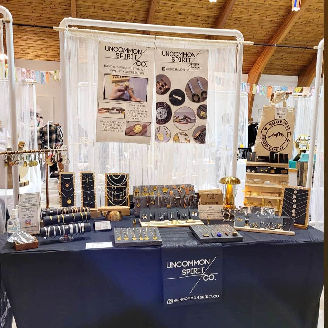 uncommon spirit co market table and display