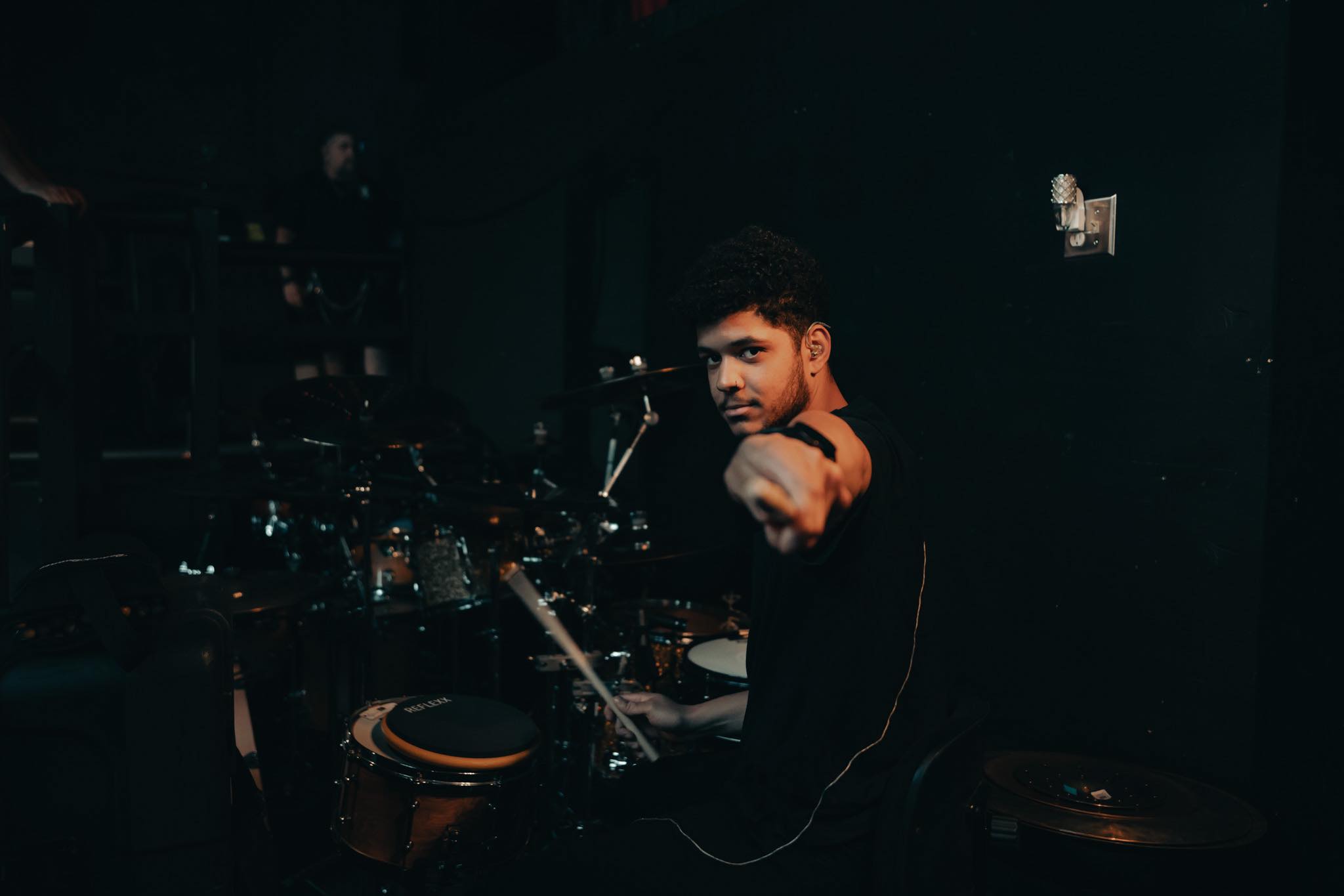photo of steven sanchez against a graffiti wall
